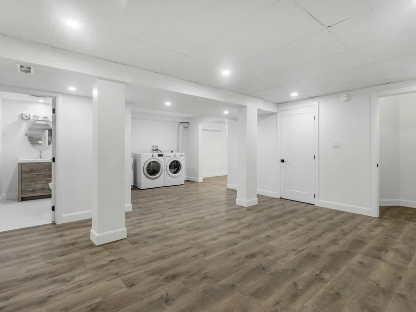 Finished basement with laundry area